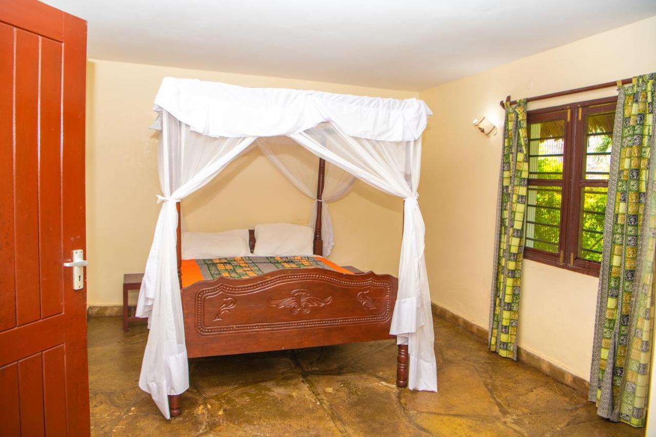 Oasis Diani Beach Villas Екстер'єр фото